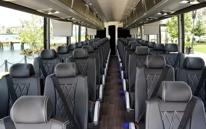 56-passenger-Premium-Motor-Coach-interior-with-high-back-seating-for-group-travel